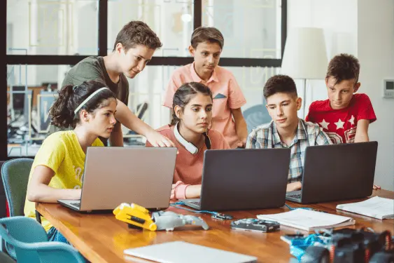 Kids working together on a computer